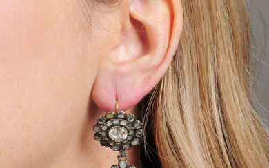 A pair of Georgian silver circular and pear-shape paste cluster drop earrings.