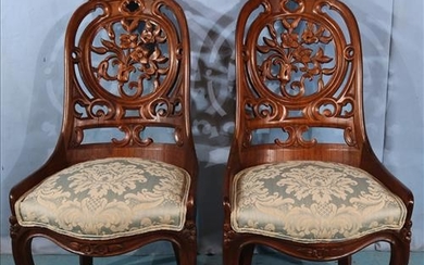 Pair laminated walnut Belter side chairs