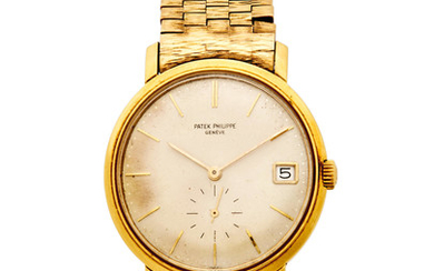 Patek Philippe. A fine 18K gold automatic wristwatch with date and a bracelet