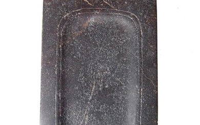 An Egyptian diorite grinding palette, Middle Kingdom