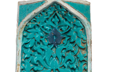 A Timurid moulded pottery squinch tile (muqarna)