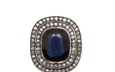 3379226. AN EARLY 20TH CENTURY DIAMOND AND BLUE GLASS BROOCH PENDANT.
