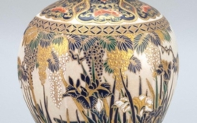 SATSUMA POTTERY JAR In ovoid from with chrysanthemum, wisteria, and iris design. Blue Shimazu crest on base. Gilt signature. Height...
