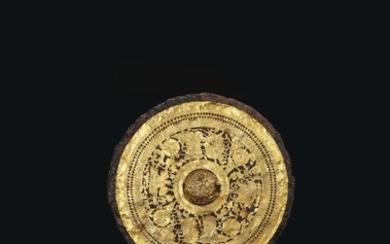 A GOLD FOIL-DECORATED IRON MIRROR, LATE EASTERN HAN-EARLY SIX DYNASTIES PERIOD OR LATER