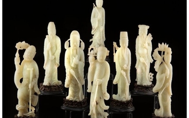 78026: A Set of Eight Chinese Pale Celadon Jade Daoist