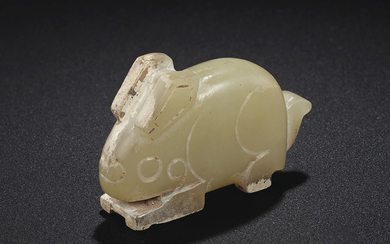 A PALE GREENISH-YELLOW JADE RABBIT-FORM PENDANT, LATE SHANG-EARLY WESTERN ZHOU DYNASTY, 12TH-11TH CENTURY BC