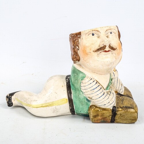 A 19th century Staffordshire Pottery pot in the form of Capt...