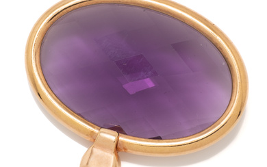A 9CT GOLD AMETHYST PENDANT; bezel set with a double...