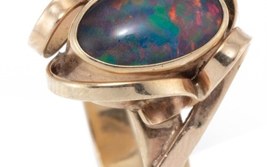 A 9CT GOLD OPAL RING; rub set with an opal triplet with applied flat wire ribbons, size O1/2, wt. 3.21g.