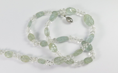 A CARVED AQUAMARINE AND CRYSTAL BEAD NECKLACE