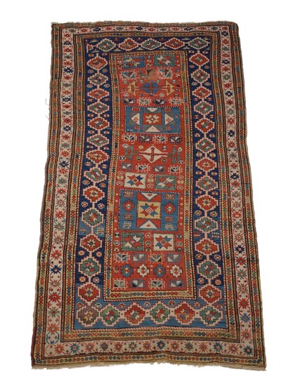 A CAUCASIAN LONG RUG, approximately 263 x 128cm