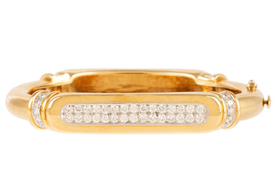 A Cartier Diamond & Gold Bangle Bracelet in 18K