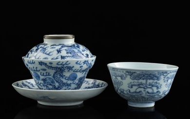 A Chinese blue and white 'flower' bowl and lidded 'dragon' bowl, 19th century