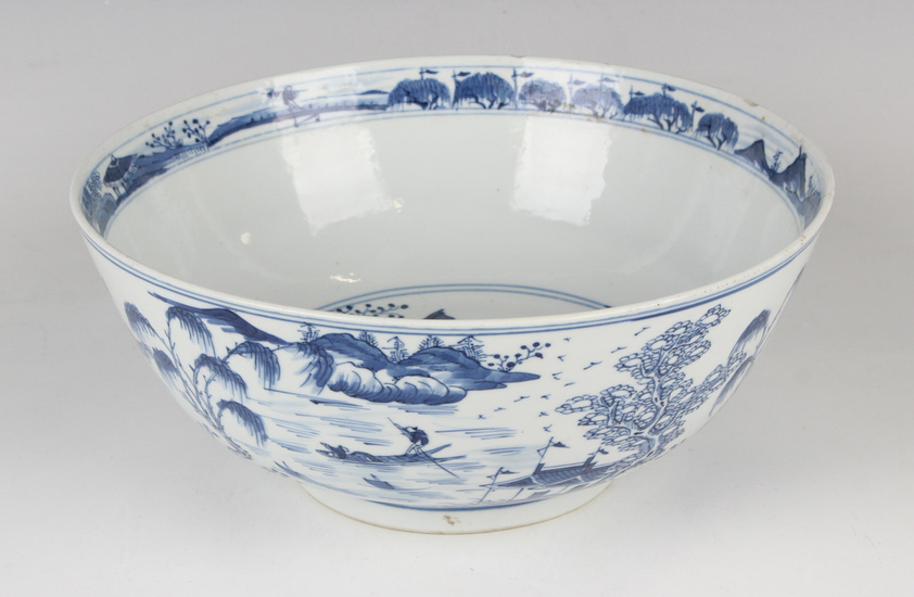 A Chinese blue and white porcelain bowl, mark of Kangxi but late 19th century, painted inside and ou
