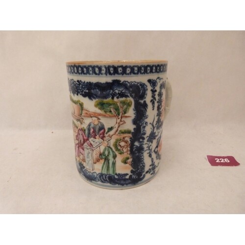 A Chinese blue and white porcelain mug, painted in coloured ...