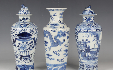 A Chinese blue and white porcelain vase, mark of Kangxi but late 19th century, painted with dragons