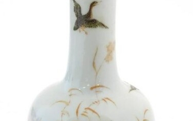 A Chinese bottle vase decorated with a landscape scene