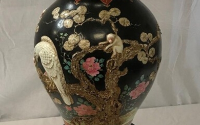 A Chinese famille-noire vase with eagle and monkey decoration,...