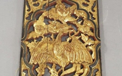 A Chinese giltwood panel, carved with phoenix amongst foliage, 63 x 40cm wide