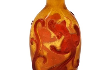 A Chinese red overlay yellow glass Chilong snuff bottle