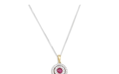 A DIAMOND AND RUBY TARGET PENDANT, the ruby to a two rowed d...