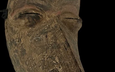 A Dan Gagon beak mask, height 30cm, width 17cm.Condition Report...