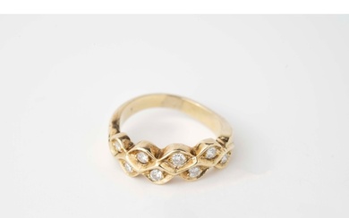 A Diamond Yellow Gold Ring Diamonds set within a honeycom...