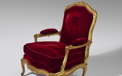 A FRENCH LOUIS XV GILTWOOD FAUTEUIL BY BLAISE...