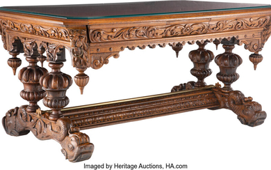A French Renaissance Revival Carved Oak Library Desk