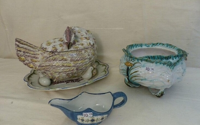 A French earthenware "Poule" tureen, a gravy boat and an (incomplete) Brussels earthenware tureen. Period: 18th century.