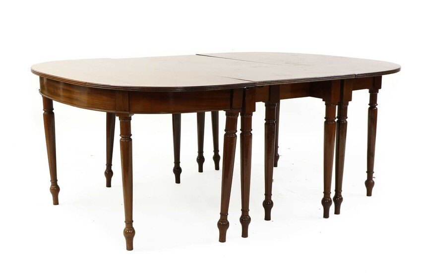 A George III Cuban mahogany extending dining table