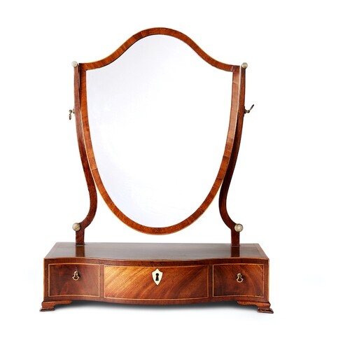 A George III mahogany and rosewood crossbanded serpentine dr...