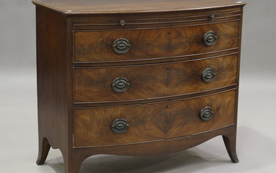 A George III mahogany bowfront chest of three long drawers, on splayed bracket feet, height 89cm, wi