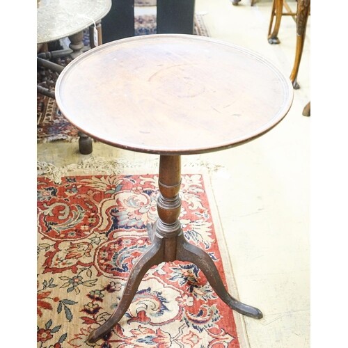 A George III mahogany tilt top tripod table, diameter 53cm, ...