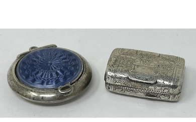 A George III silver vinaigrette, London 1816, and a silver a...