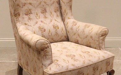 A George III style wingback armchair, late 19th/early 20th c...
