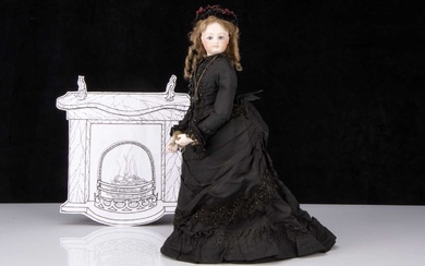 A Jumeau bisque swivel head fashionable doll in mourning dress