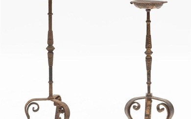 A PAIR OF 19TH CENTURY GILDED IRON CANDLE HOLDERS ON SCROLLED TRIPOD BASES, 52CM H