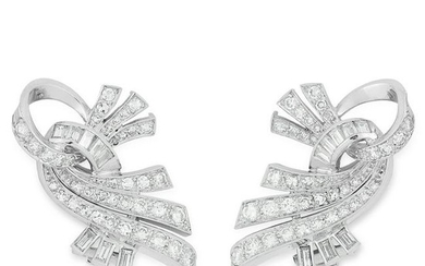 A PAIR OF DIAMOND CLIP EARRINGS set with round and