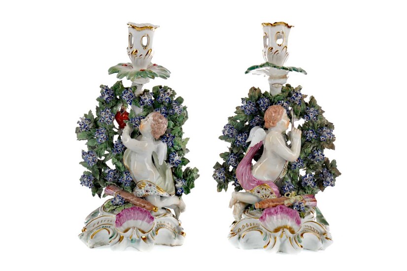 A PAIR OF EARLY 19TH CENTURY ENGLISH PORCELAIN FIGURAL CANDLESTICKS