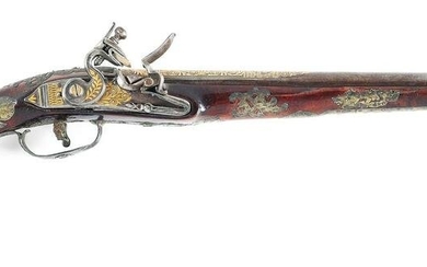 (A) PROFUSELY DECORATED MIDDLE EASTERN FLINTLOCK