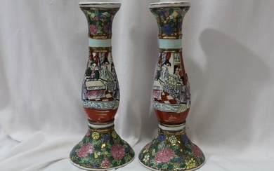 A Pair of Chinese Rose Medallion Candle Sticks