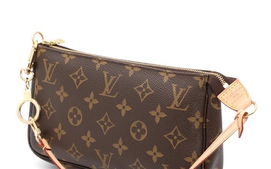 A “Pochette Accessoires” of brown monogram canvas with patinated leather trimmings, gold...
