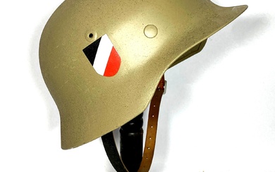 A Replica WWII German Helmet with Leather Strap