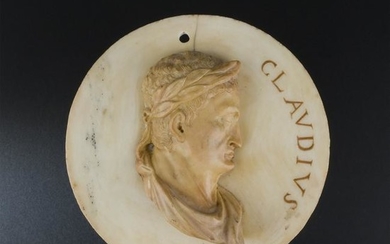 A Roman white marble and giallo di Siena medallion