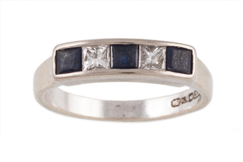 A SAPPHIRE AND DIAMOND FIVE STONE RING mounted in 18ct white...