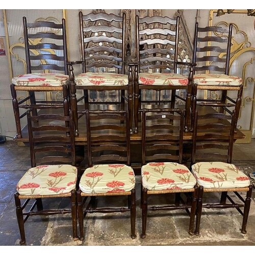 A SET OF EIGHT 19TH CENTURY STYLE OAK LADDER BACK DINING CHA...