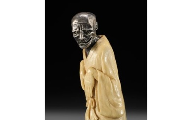 A SILVER AND ANTLER NETSUKE OF A GHOST, YUREI, ATTRIBUTED TO GEORGES WEIL