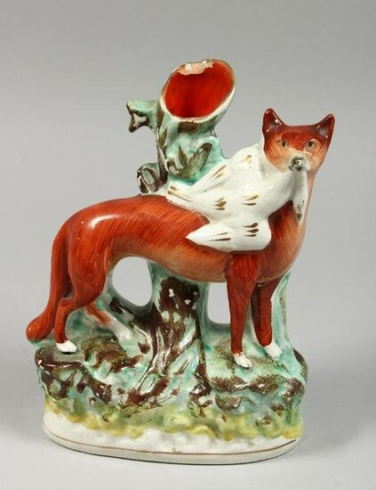 A STAFFORDSHIRE SPILL VASE with a figure of a fox with