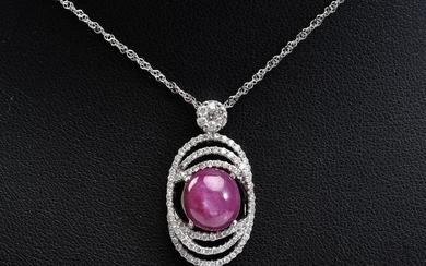 A STAR RUBY AND DIAMOND PENDANT